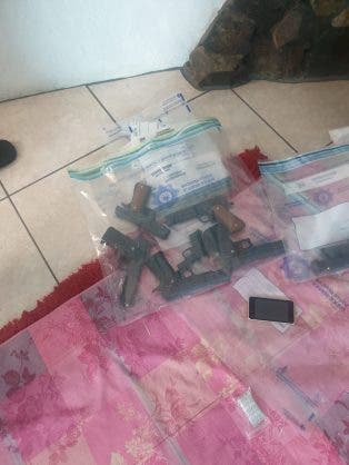 Foreign military uniform and guns recovered in house of alleged kidnapping syndicate in Joburg