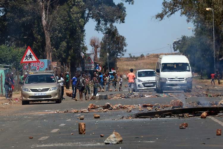 Shots fired as police and protesters clash over evictions