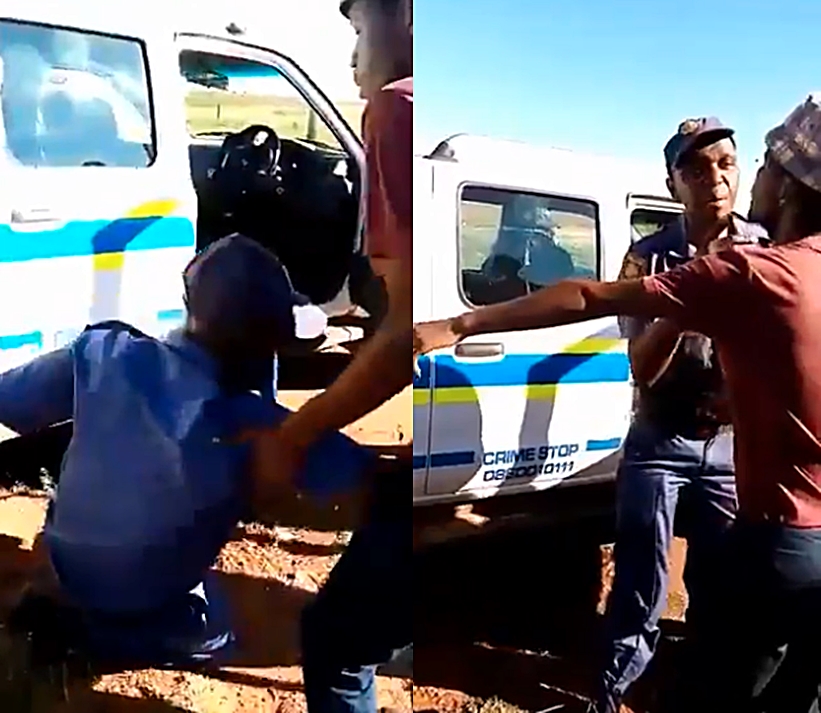 Heavily drunk police officer struggles to check damage on state car after hitting fence