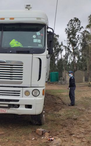 An NSPCA inspector next to the truck at the Beitbridge border