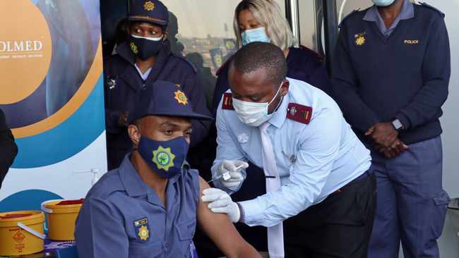 police officer vaccinated