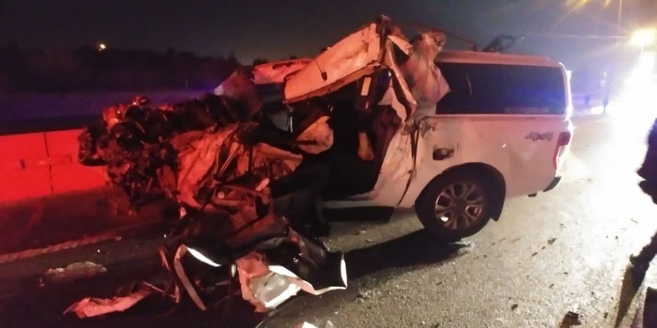 Bakkie driver escapes injury after slamming into back of truck