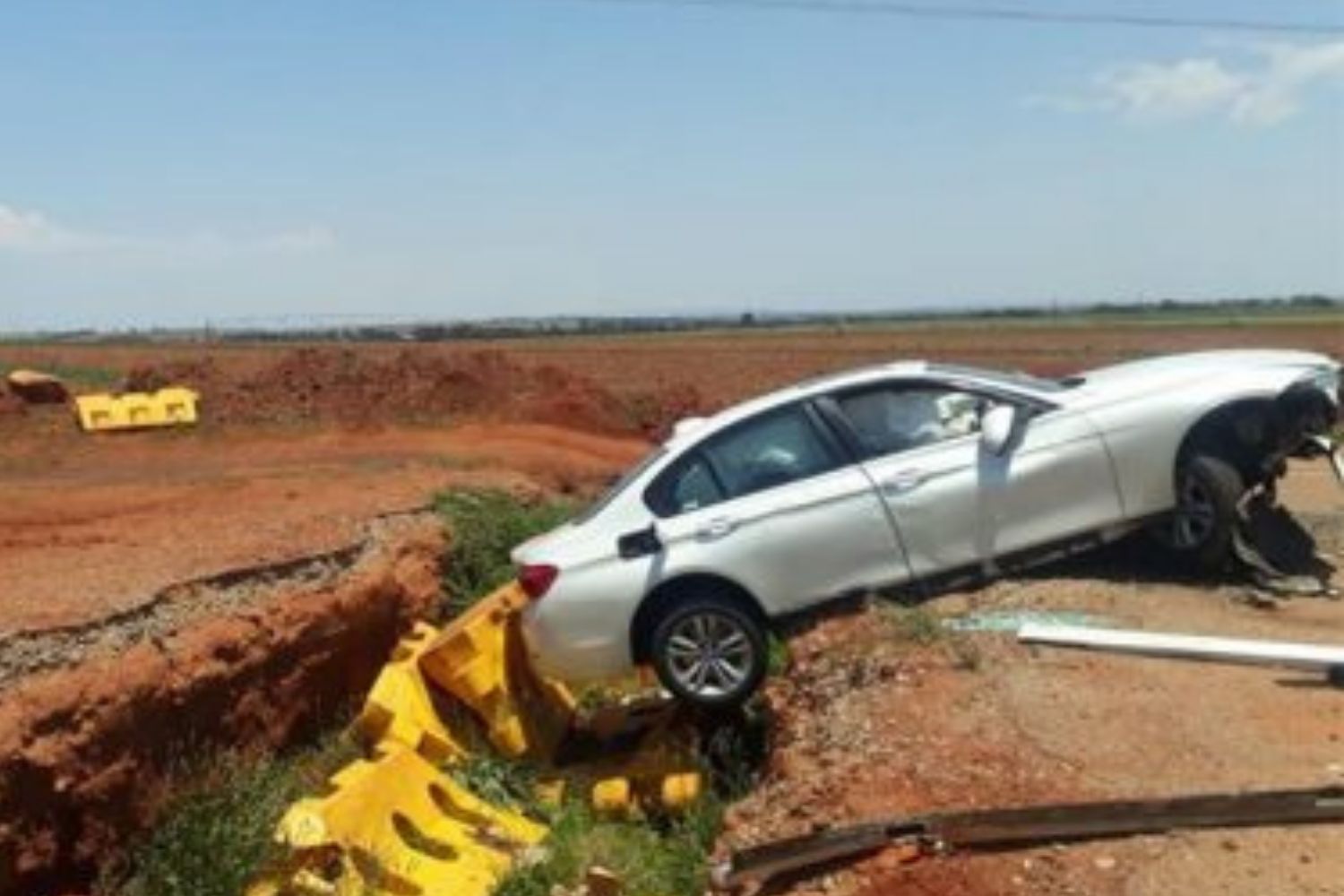 Driver injured after driving into sinkhole with no barriers around it