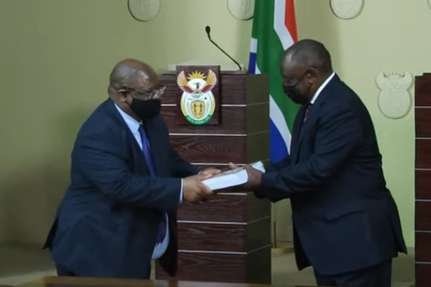 Acting Chief Justice Raymond Zondo hands over the first part of the State Capture Commission of Inquiry's report to President Cyril Ramaphosa