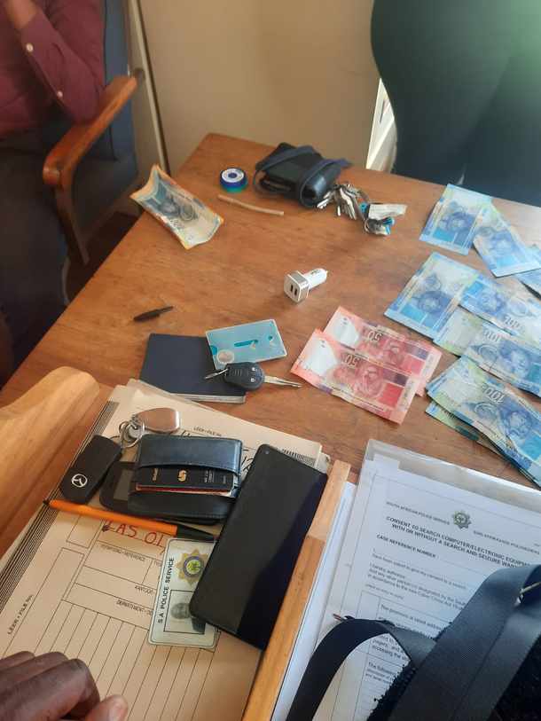 Police officer arrested moments after taking bribes from relatives of 2 women arrested for shoplifting