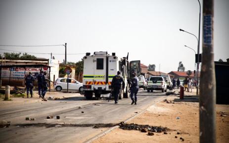 South African Police Service (Saps) officers stationed in Tembisa to monitor the EFF's national shutdown
