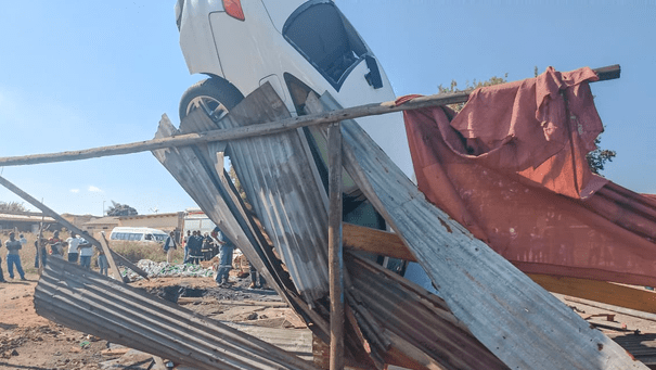 Audi lands on top of shacks in Ekurhuleni after driver loses control