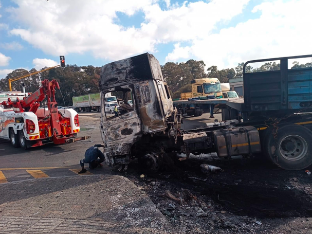Police officers rescue biker from raging inferno after he crashed into heavy truck in Ekurhuleni
