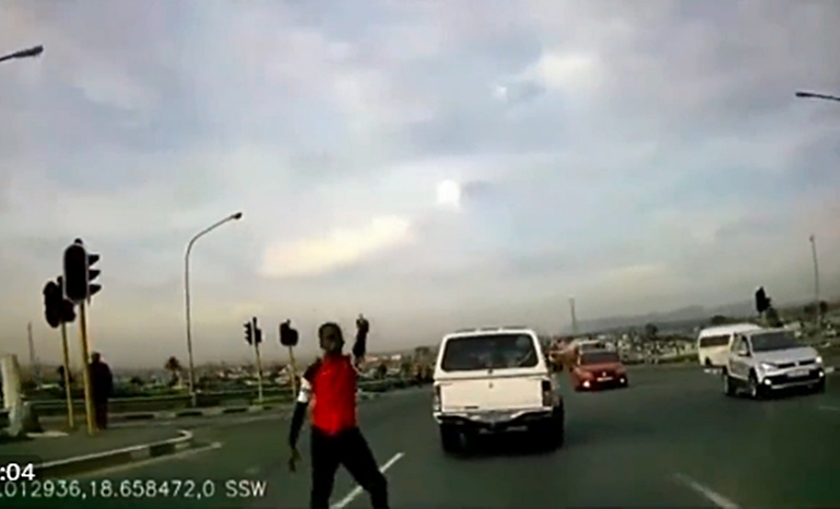 Driver praised for knocking into gun-wielding man on busy Cape highway